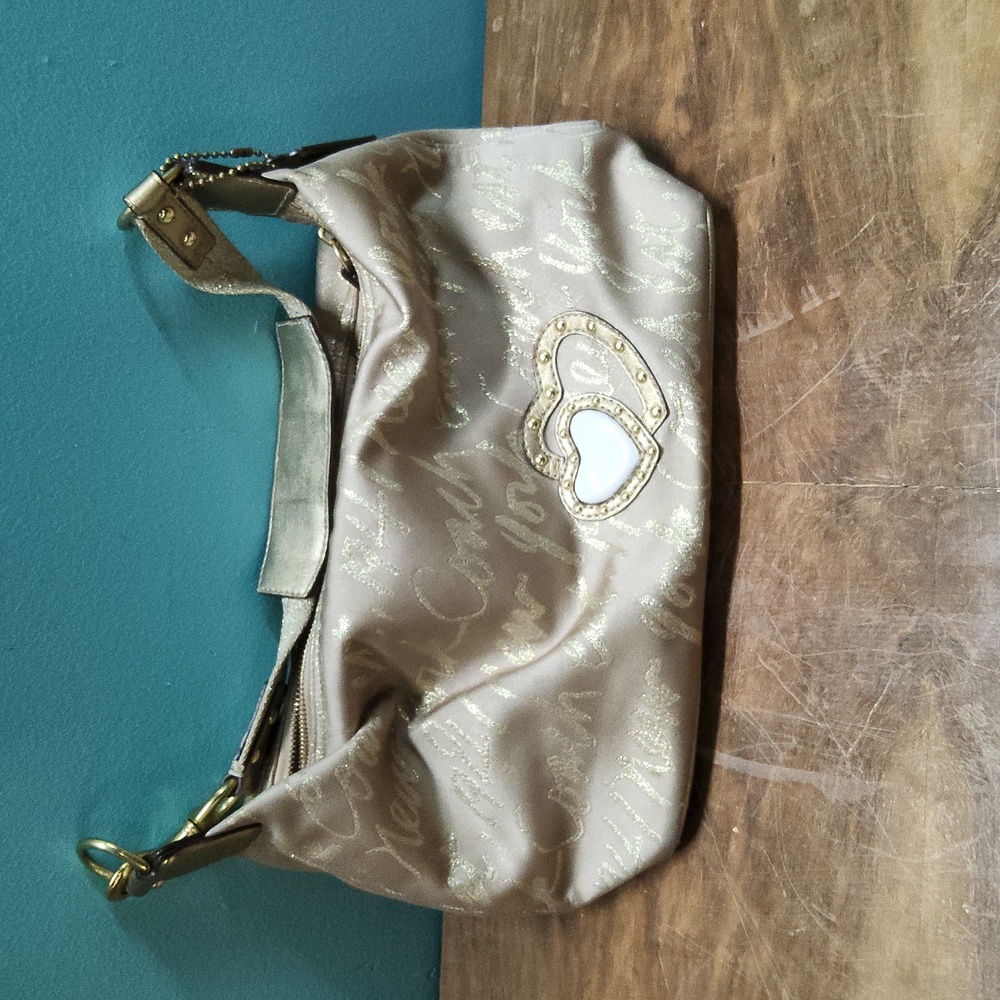 Gold coach purse
